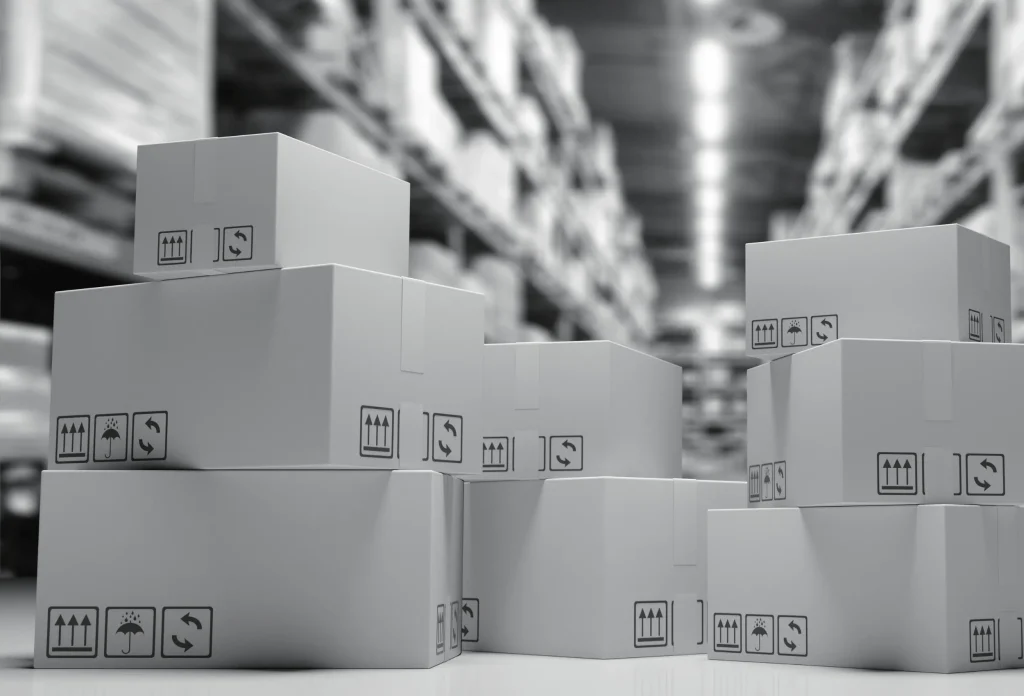 Stacks of cardboard boxes ready for shipping in 3PL warehouse