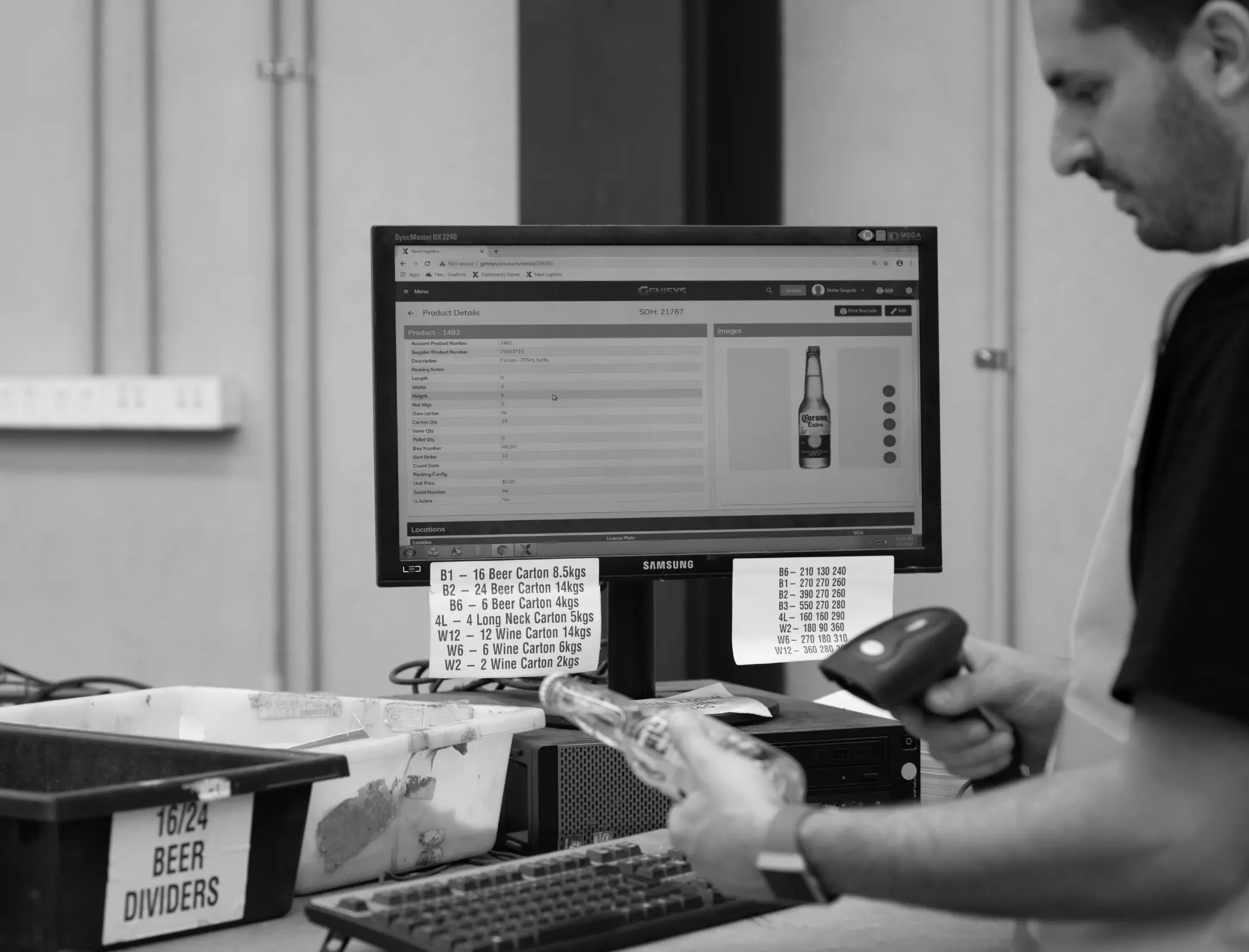 Logistics specialist scanning items during inventory de-kitting process